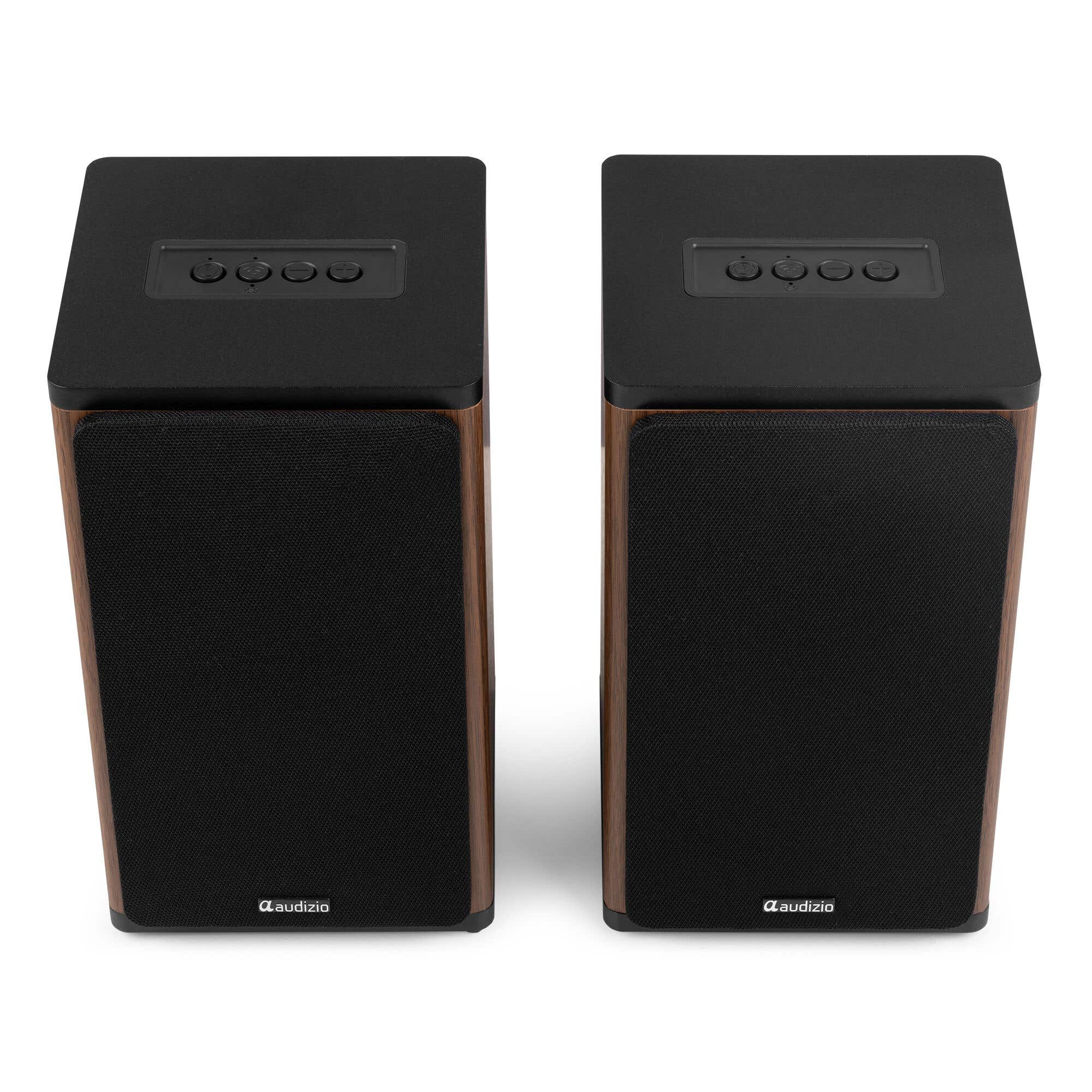 Dos altavoces negros con marcos de madera y botones de control arriba.