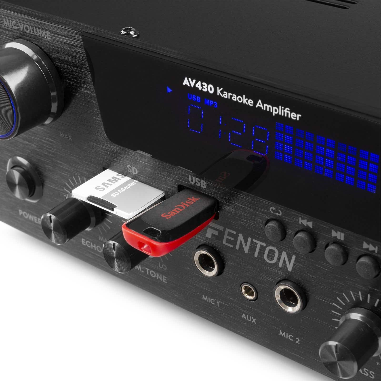 Un amplificador de karaoke negro con tarjeta SD y unidad USB.