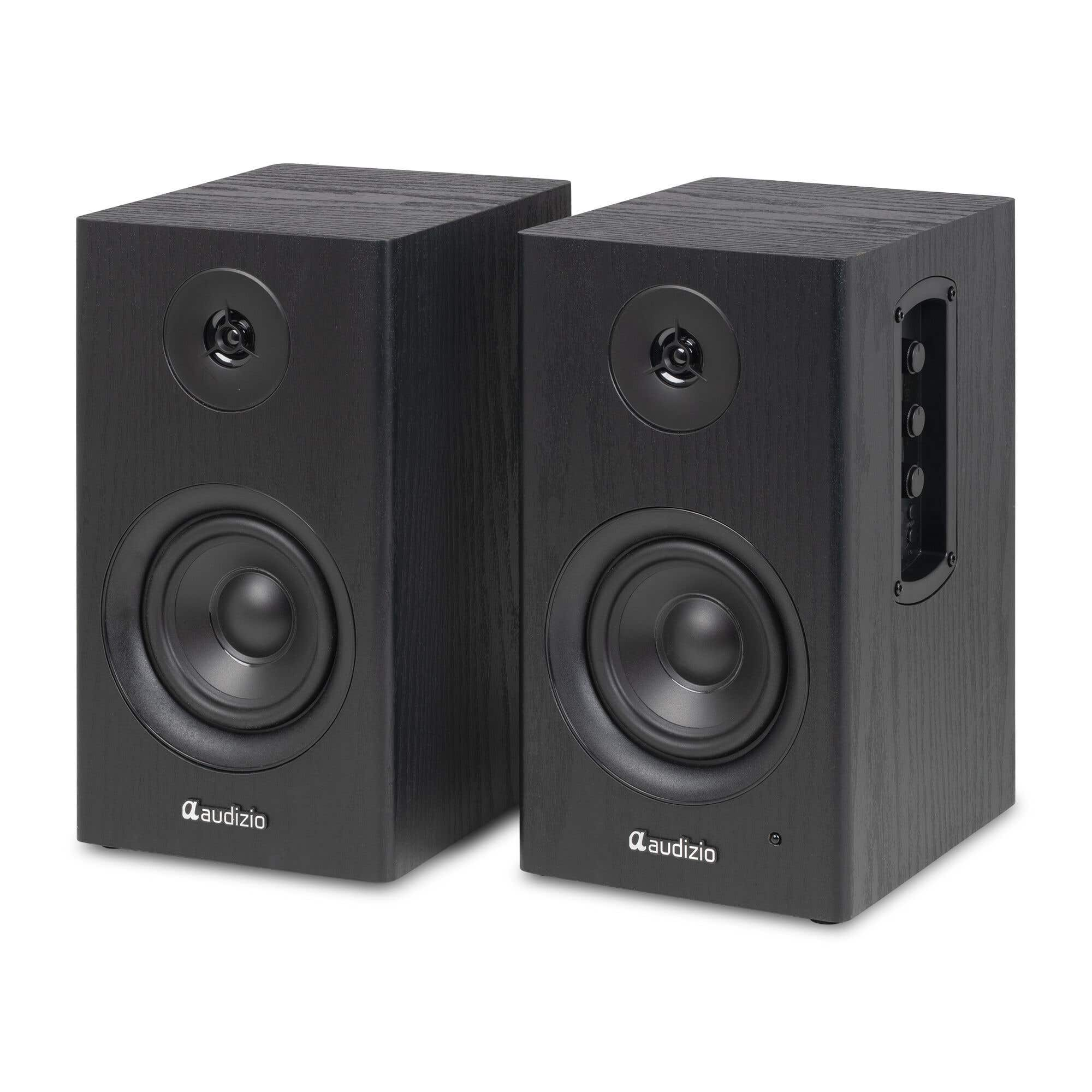 Dos altavoces negros de grano de madera, cada uno con un tweeter y un woofer.