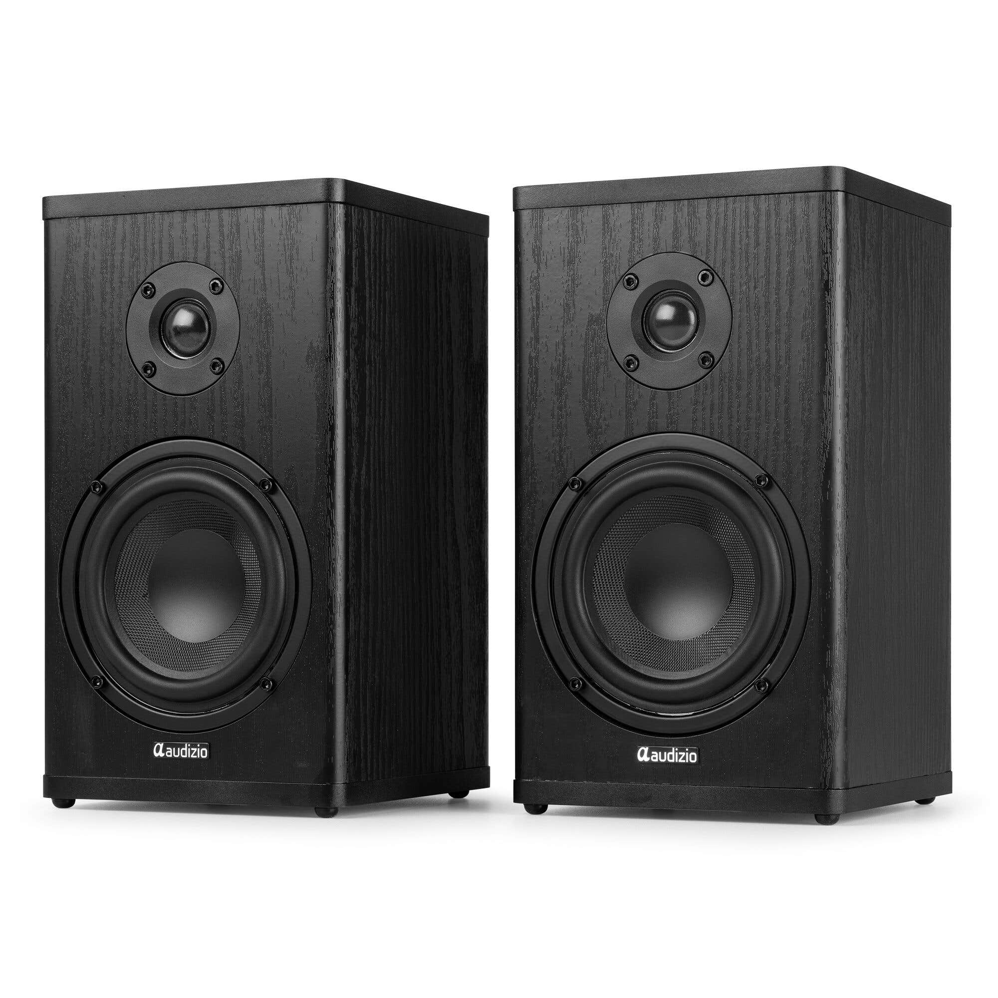 Dos cajas de altavoces negras con veta de madera, con altavoces de agudos y graves.