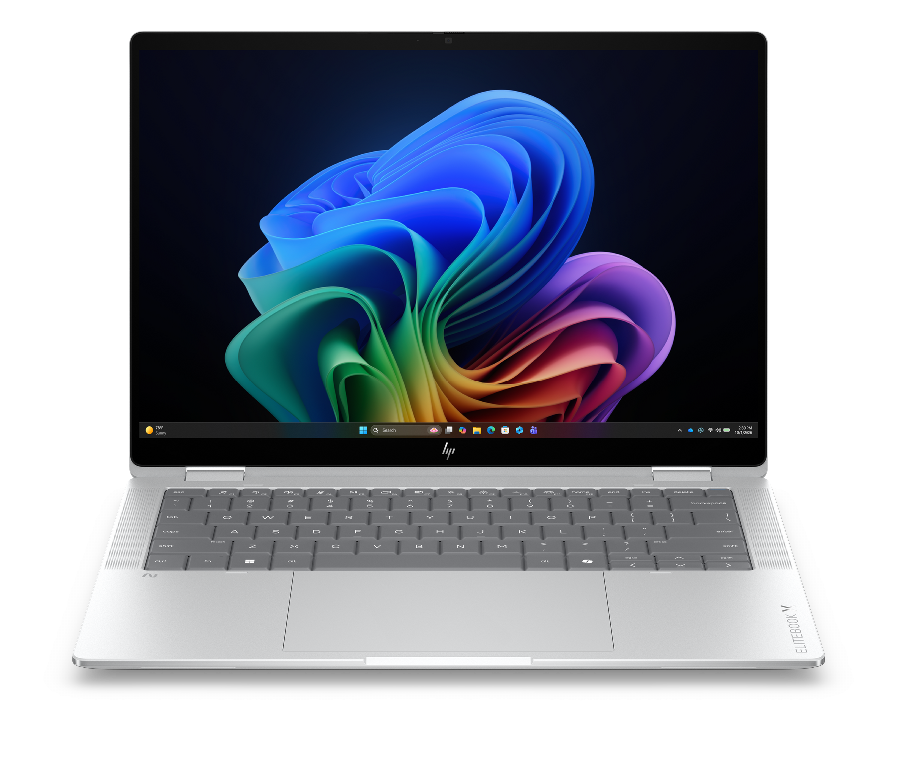 Un laptop argentato con uno sfondo colorato. Tastiera e touchpad visibili.
