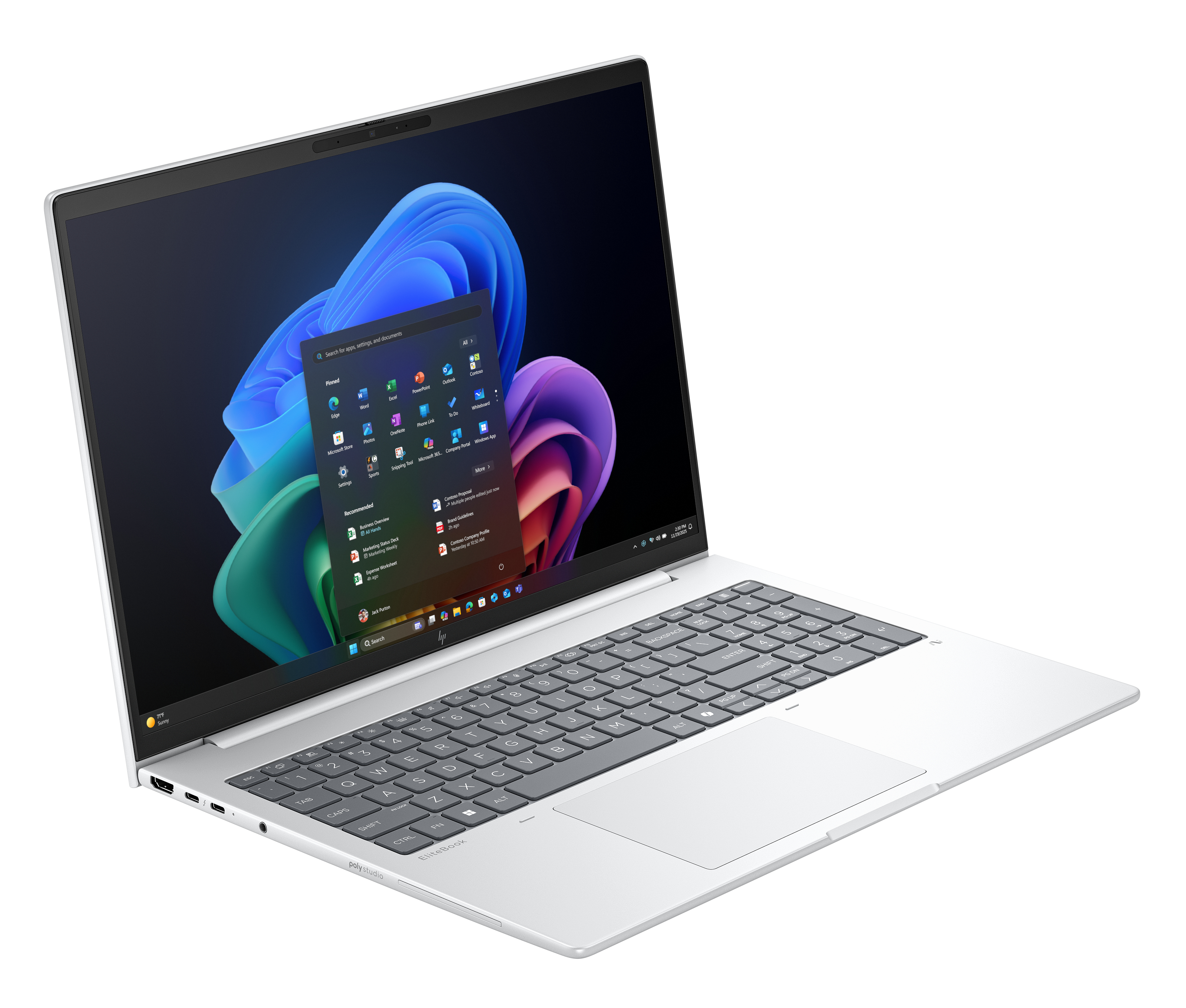 Zilveren laptop met verlicht toetsenbord en geopend Windows Startmenu.