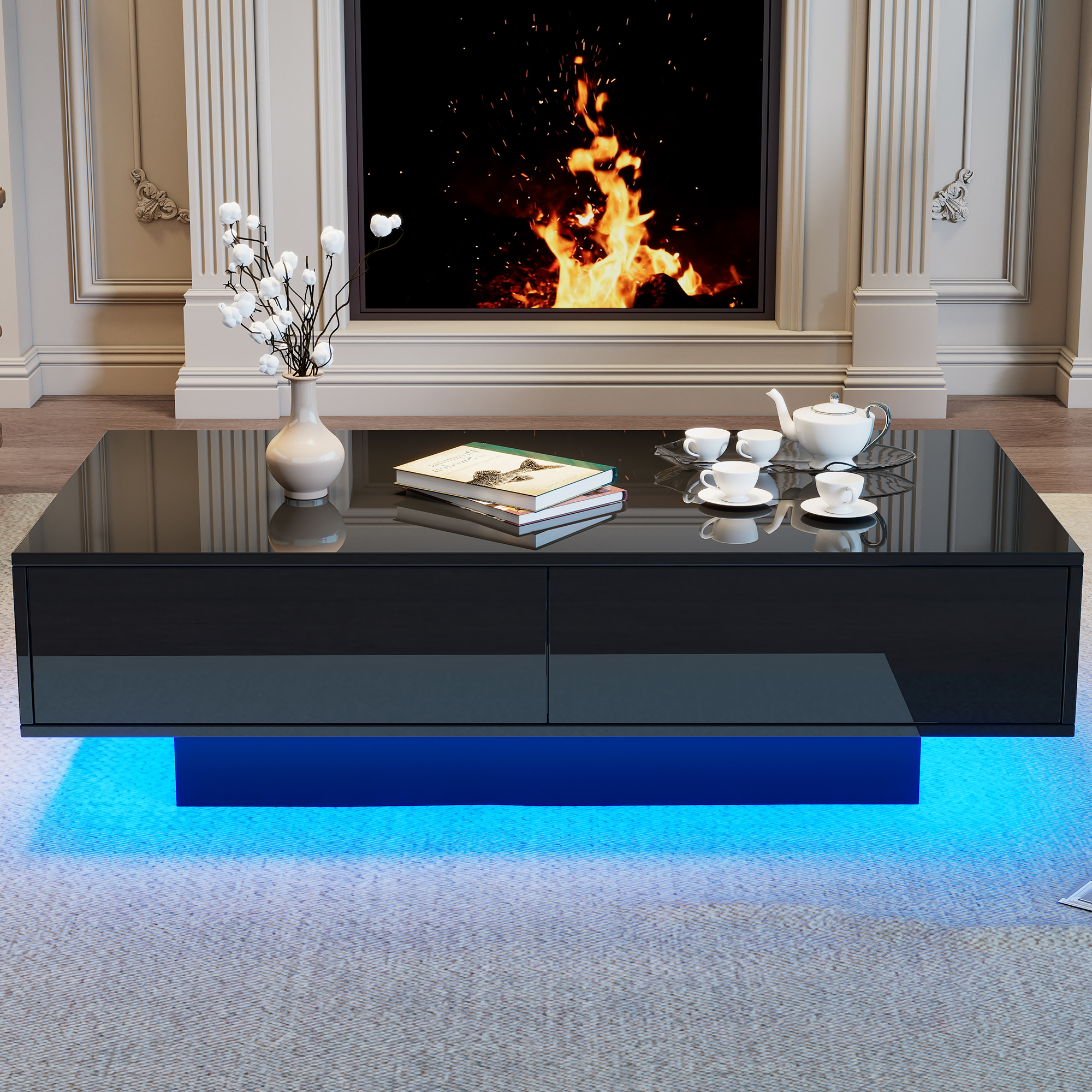 Ein moderner schwarzer Couchtisch mit blauem LED-Licht, Büchern und Teegeschirr.