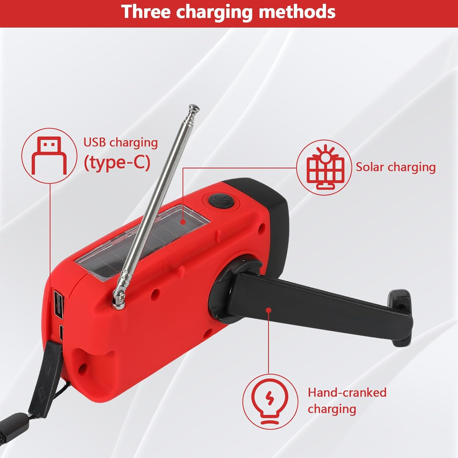 Ein rotes Gerät mit Solar-, USB- und Handkurbelladung, mit Beschriftungen.