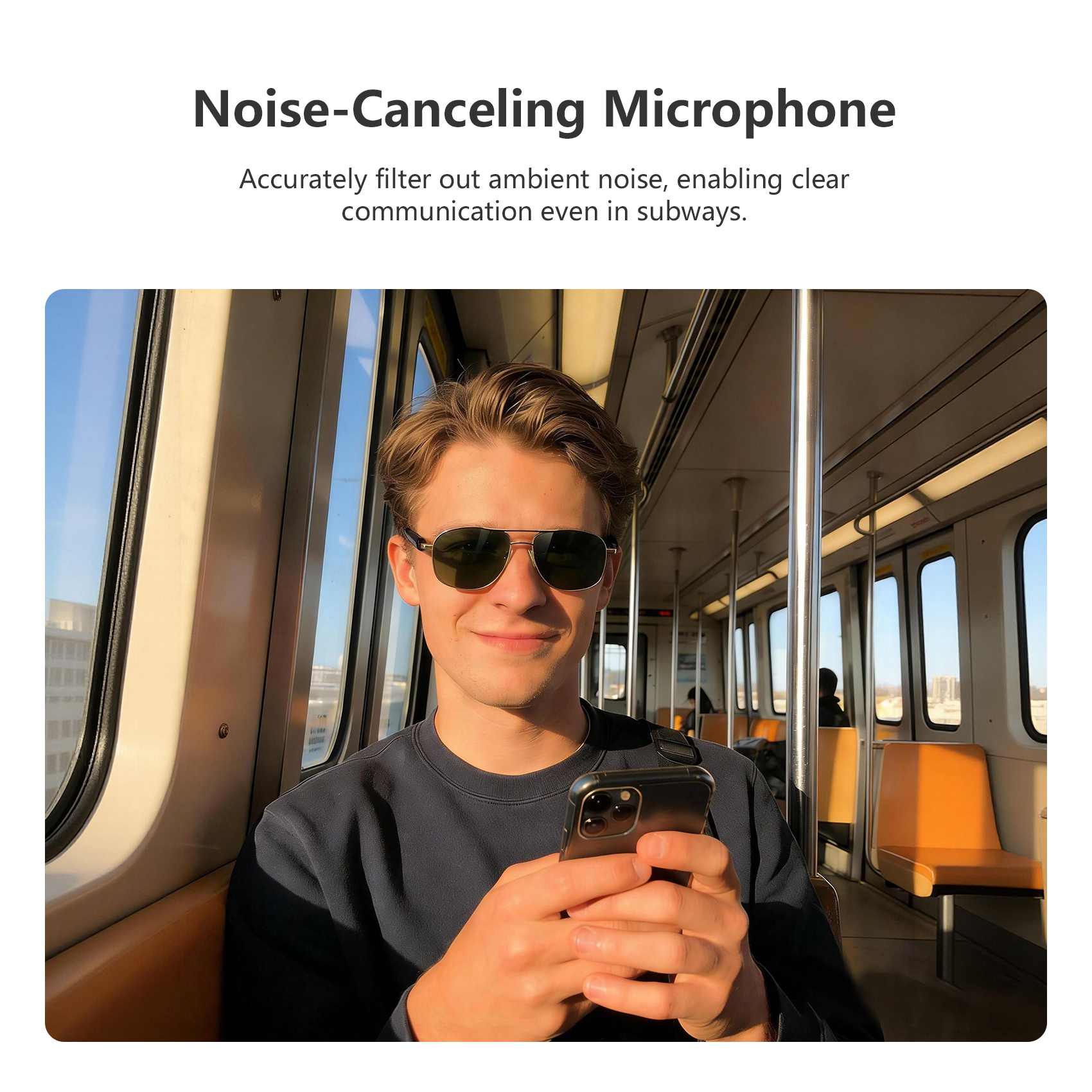 Junger Mann mit Sonnenbrille im Zug, der ein Handy hält.