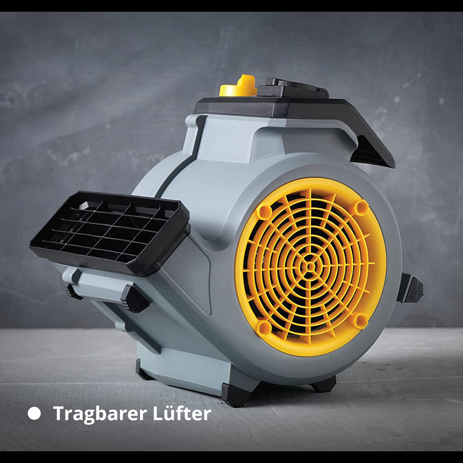 Grauer und gelber tragbarer Lüfter mit Lüftungsgitter und Lüfterrad.