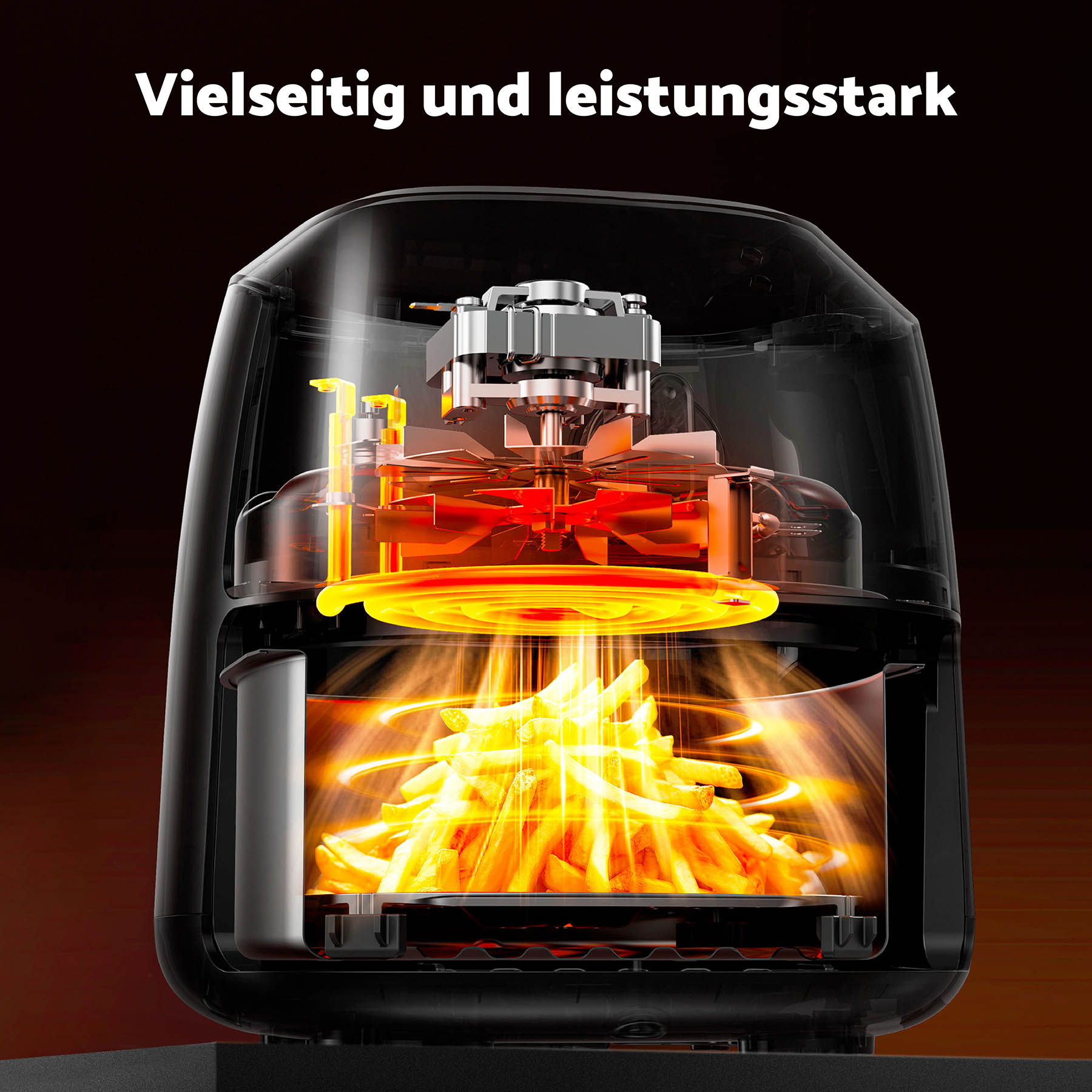 Einblick in einen Airfryer, der Pommes Frites mit Heißluft zubereitet.