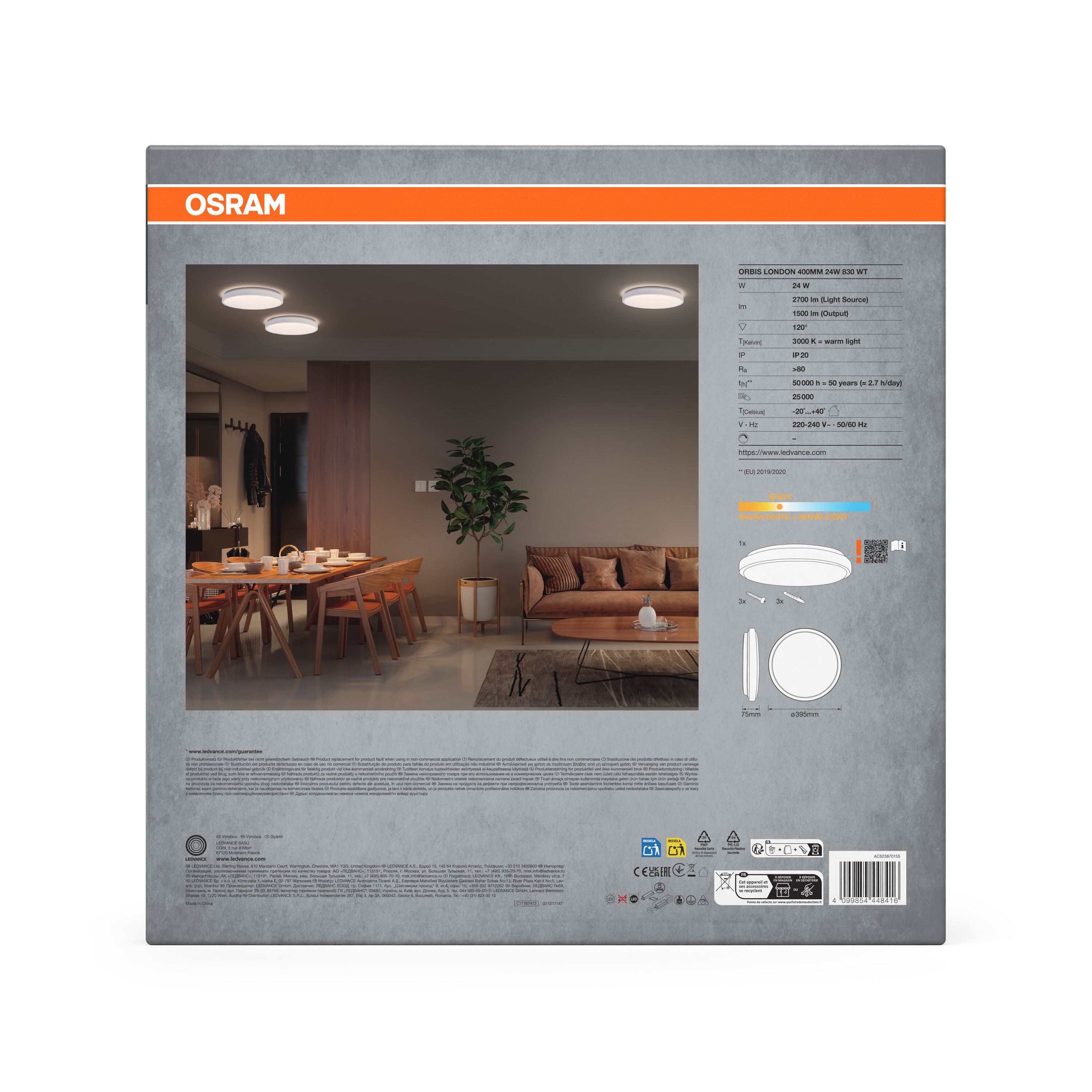 Ein stilvolles Wohnzimmer mit zwei runden Osram Deckenleuchten, Möbeln und Pflanzen.