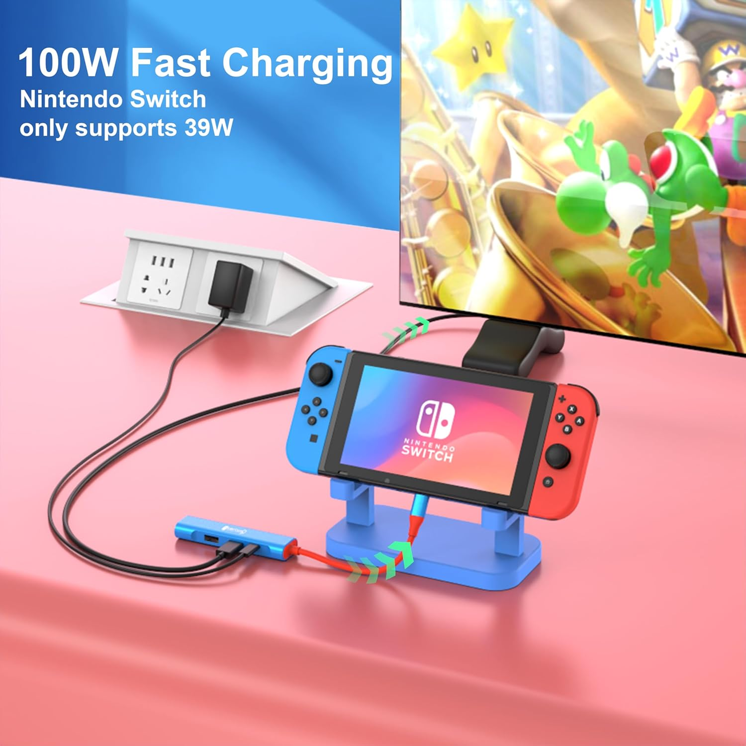 Nintendo Switch im Ständer, mit Netzteil und Ladeadapter auf rosafarbenem Tisch.
