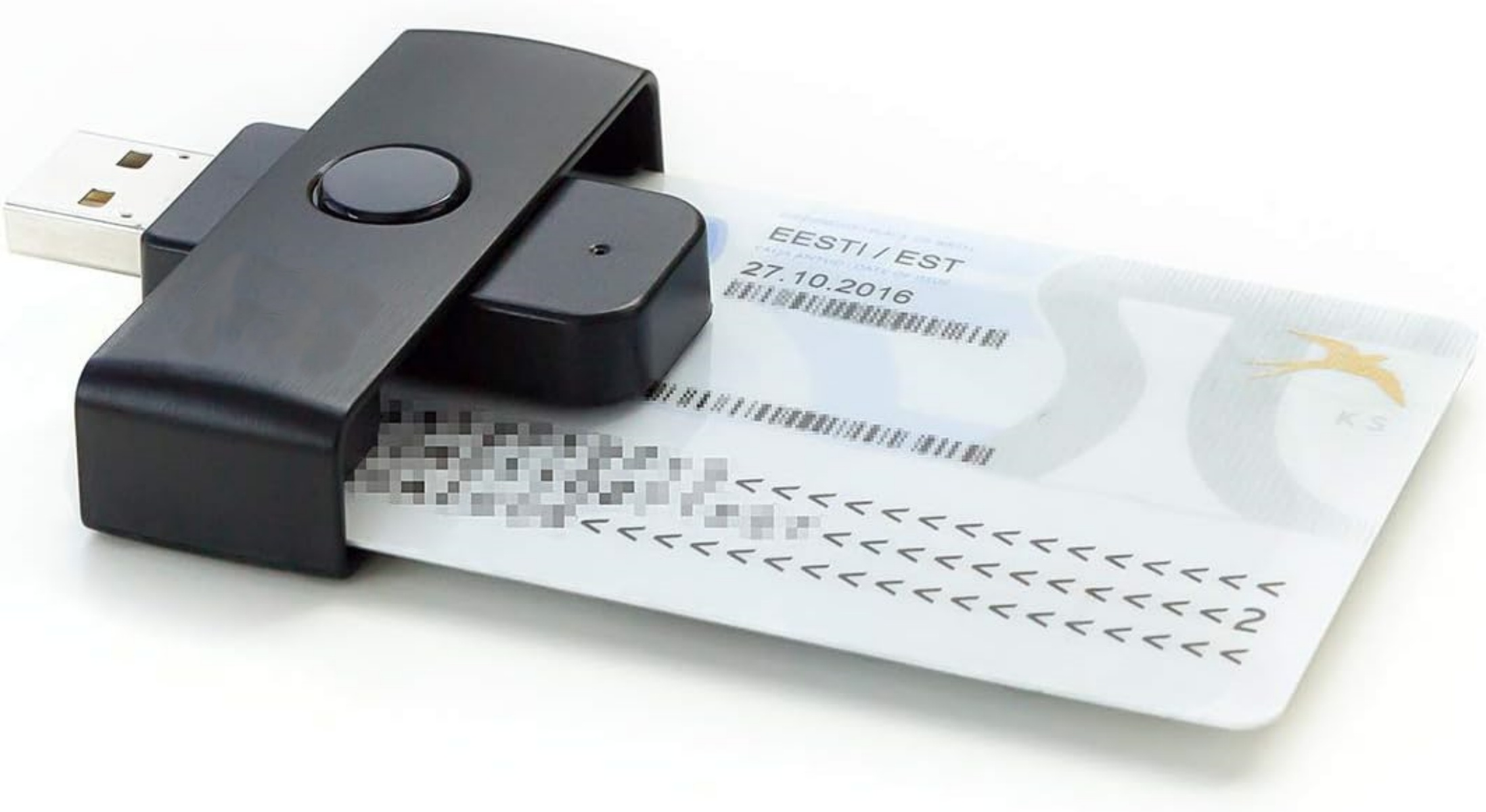 Ein schwarzes Lesegerät mit USB-Anschluss steckt in einer Karte mit Barcode.