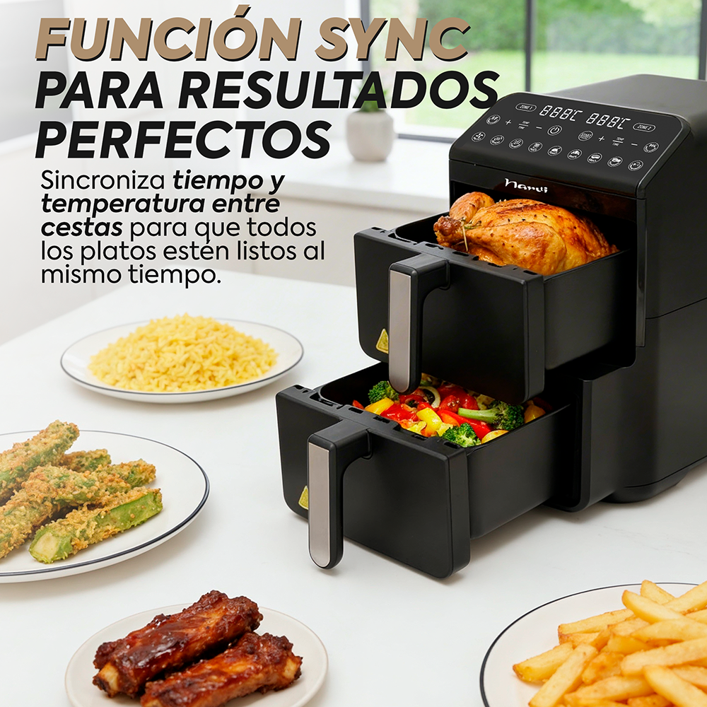 Una freidora de aire negra de doble cesta con pollo asado y verduras.