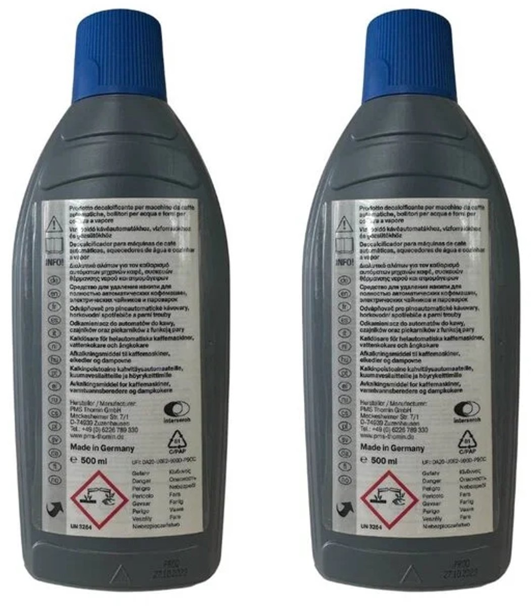 Two gray bottles with blue caps, 500ml decalcifier, Made in Germany.