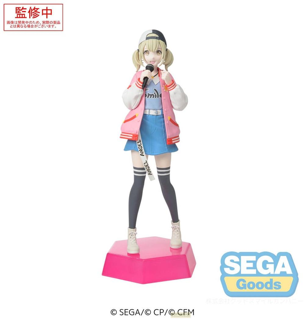 Anime-Figur einer Sängerin mit Mikrofon, sie trägt eine pinke Jacke und blauen Rock.