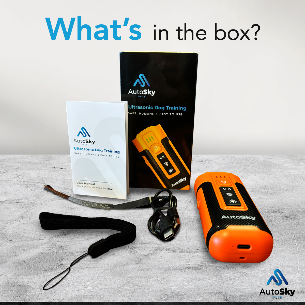 Contenido de la caja: dispositivo de entrenamiento para perros naranja, manual de usuario, correa de muñeca negra, cable USB.