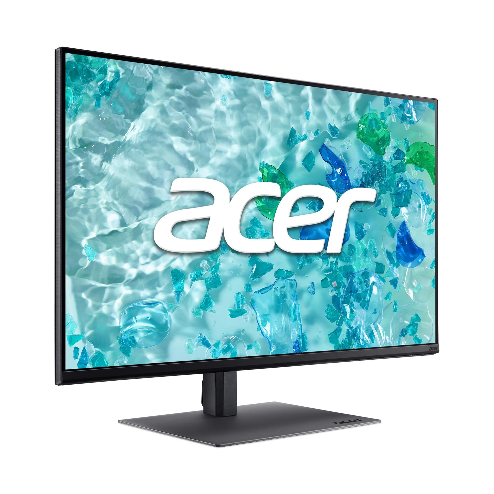 Un monitor Acer mostra uno sfondo astratto di frammenti blu-verdi.