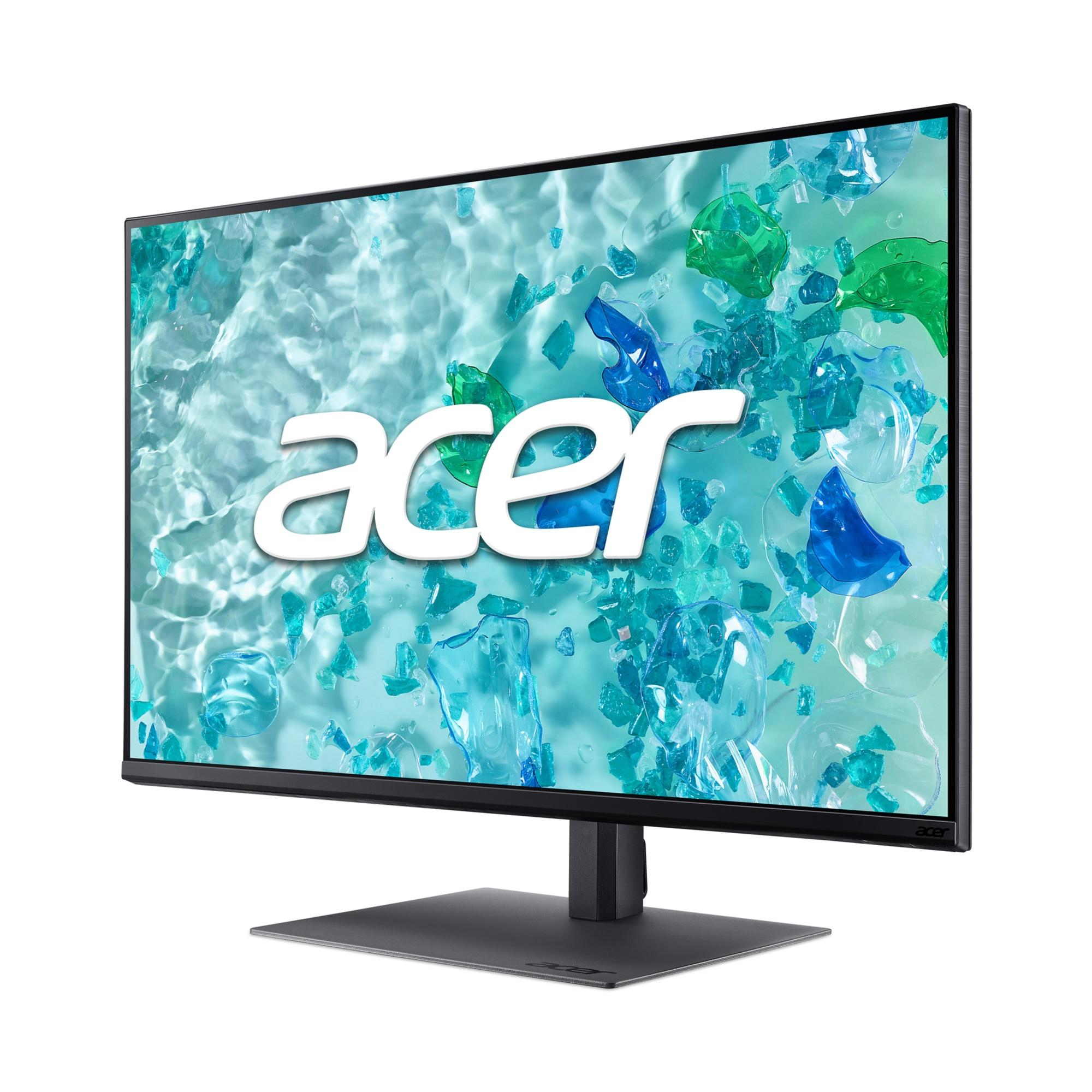 Un monitor Acer mostra un design astratto blu e verde con il logo Acer.