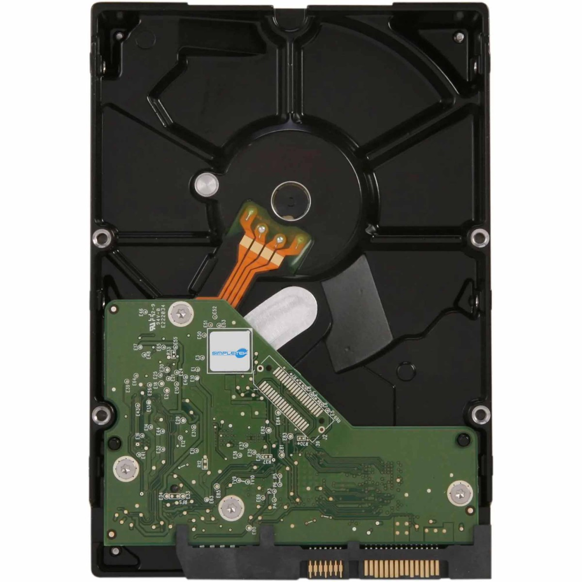 Vista interna di un hard disk nero. Scheda a circuito stampato verde con componenti visibili.