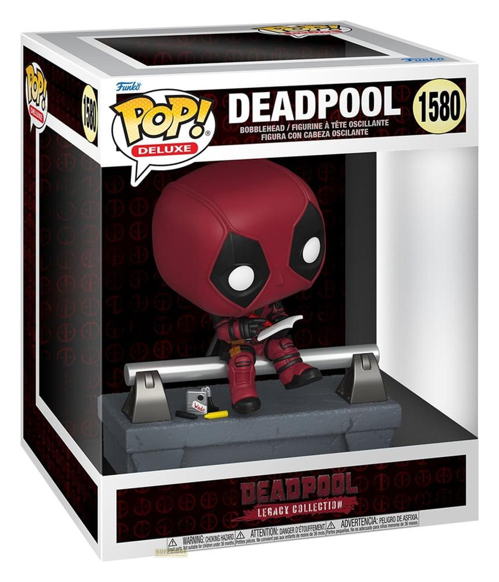 Figura Deluxe Pop! de Deadpool en caja, sentado con cuchillo y cámara.