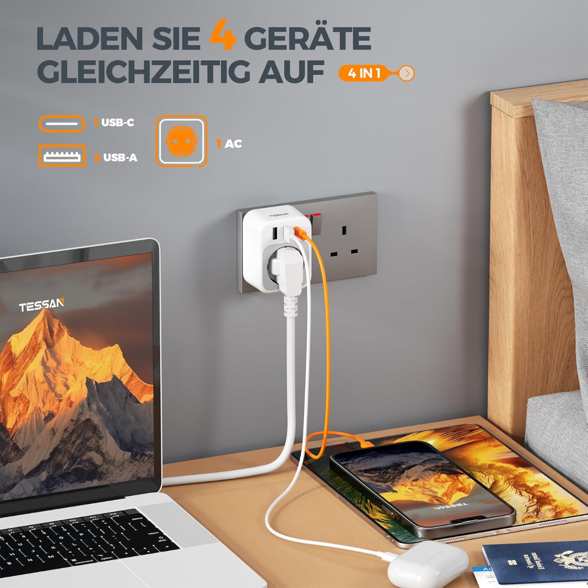 Un adaptador de viaje blanco carga portátil, móvil y auriculares por enchufes y USB.