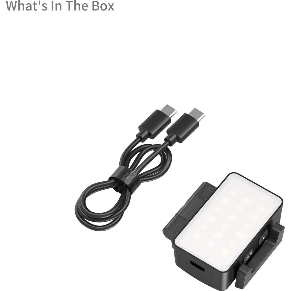 Un câble USB-C noir et une petite lumière LED avec support.
