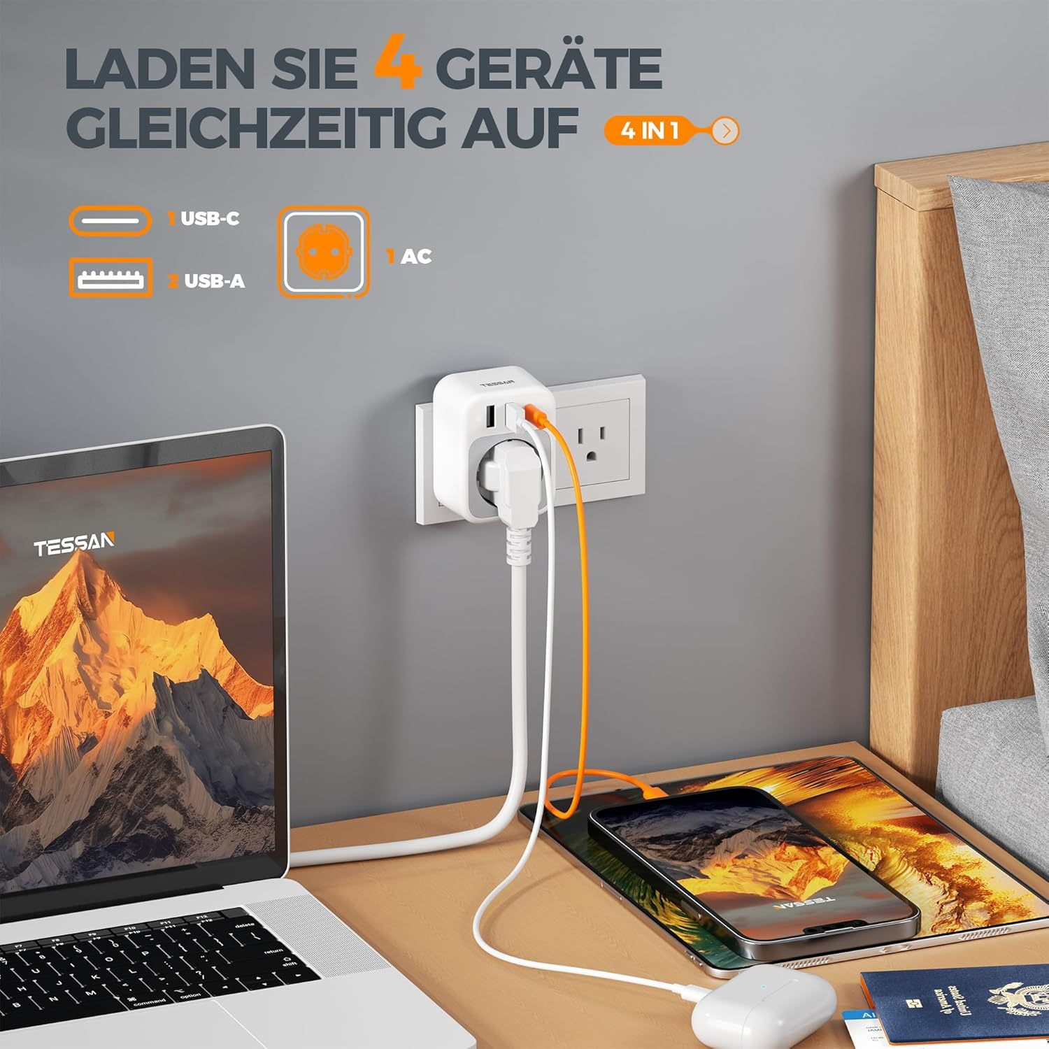 Un adaptador de enchufe blanco con 2 USB-C, 2 puertos USB-A carga dispositivos.