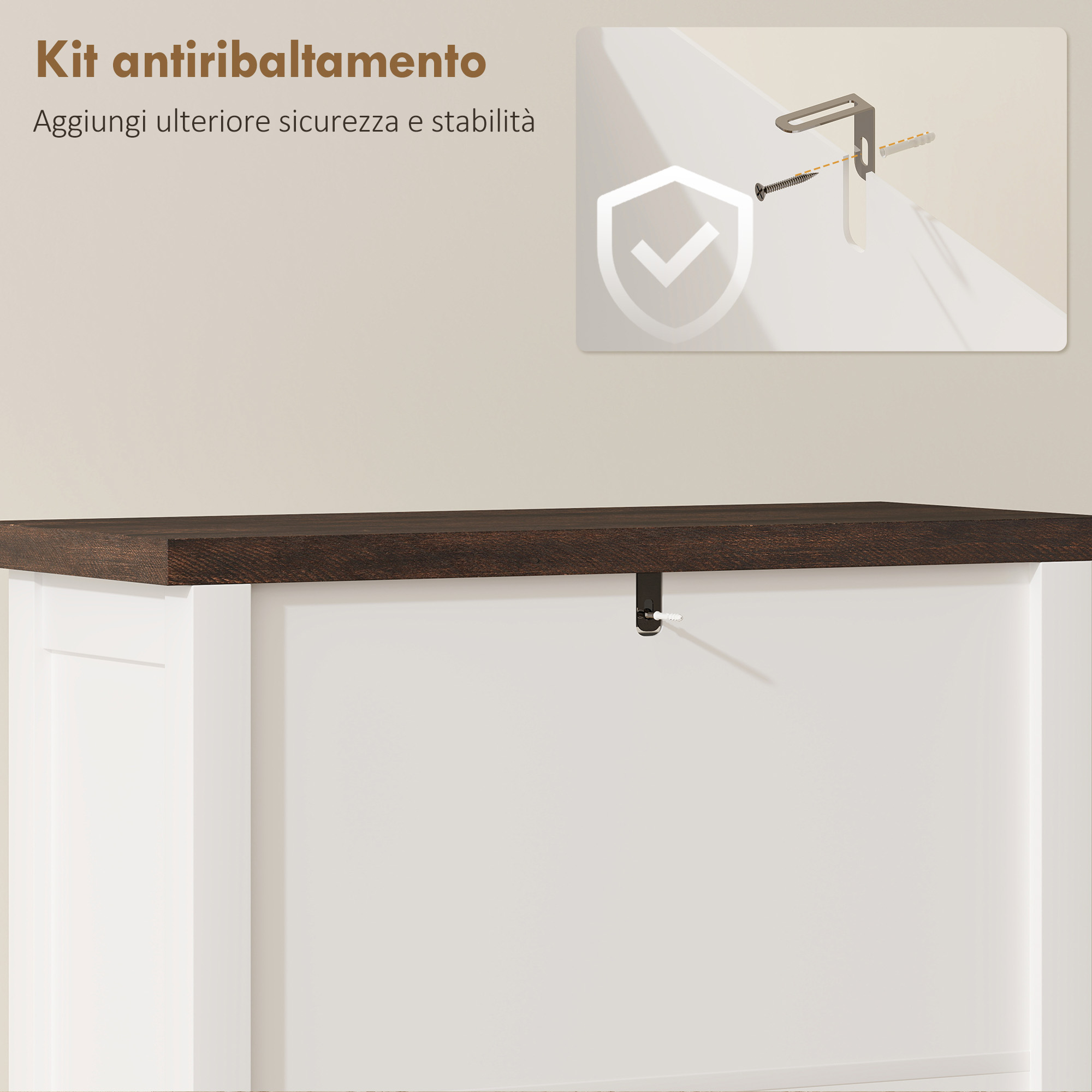 Un kit antiribaltamento con vite e tassello è fissato a un mobile bianco.