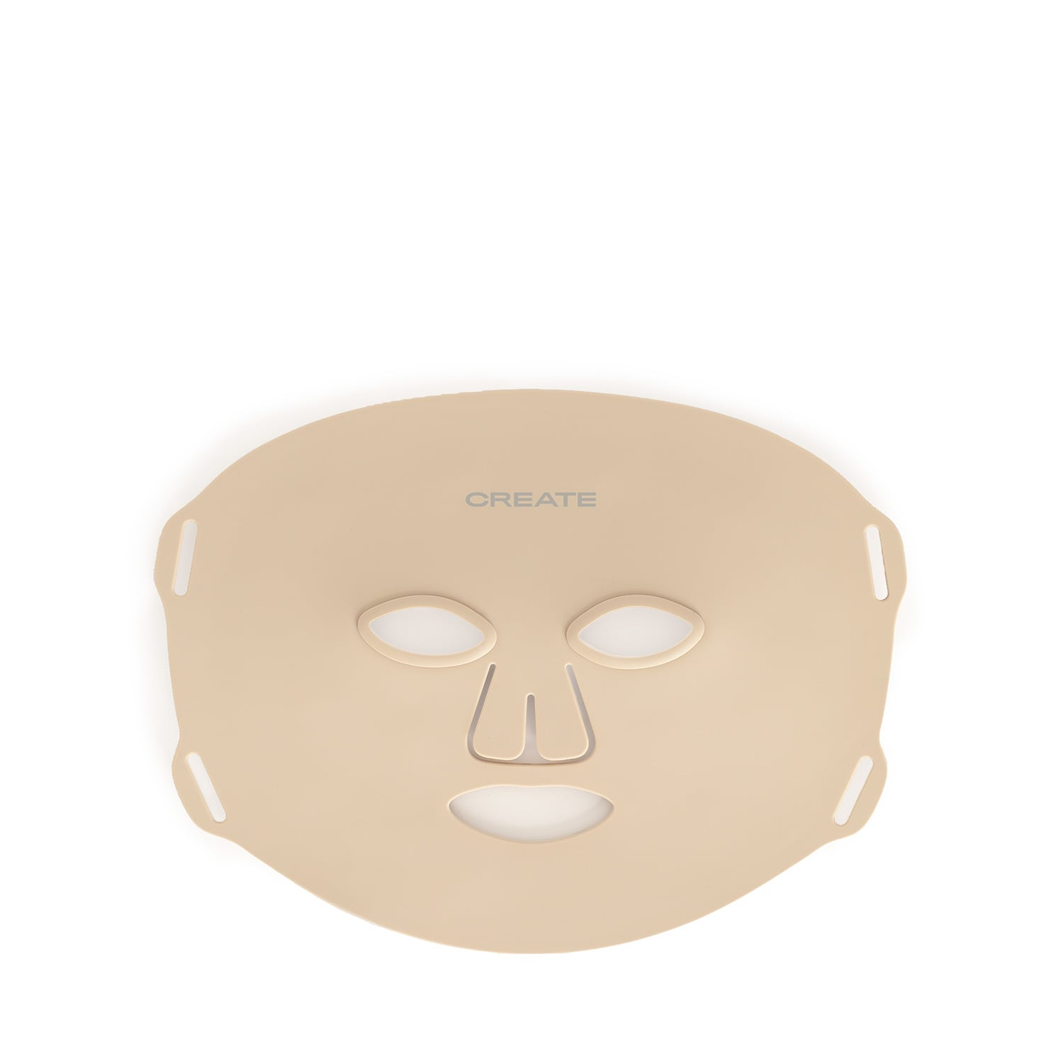 Una mascarilla facial beige con recortes para ojos, boca y nariz.