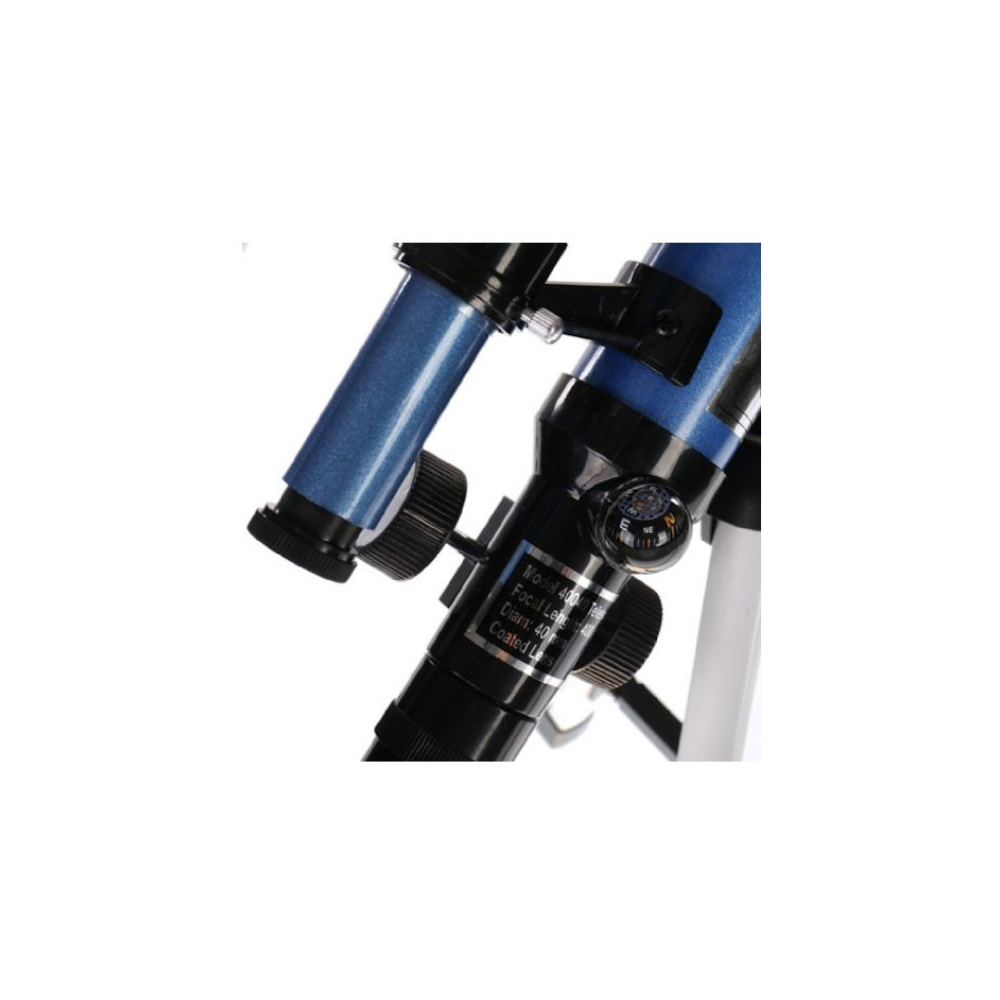 Close-up van een blauwe telescoop met scherpstelknoppen en een klein kompas.