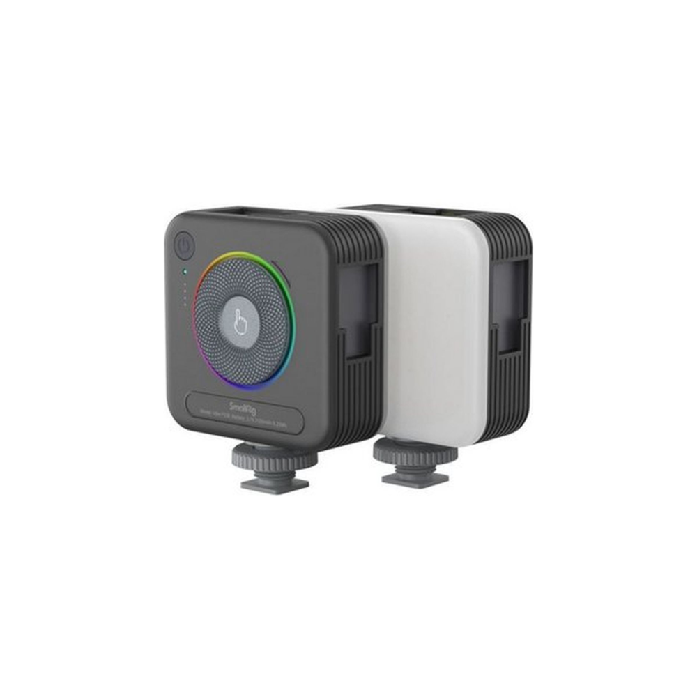 Compacte zwarte lamp met RGB-ring en diffuser op statiefbevestigingen.