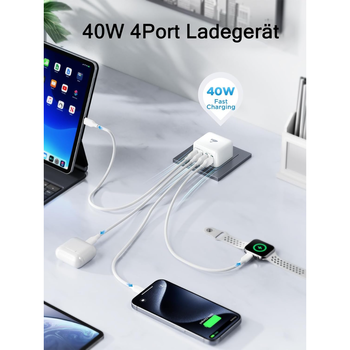 Ein weißes 40W Ladegerät lädt ein Tablet, AirPods, Smartphone und Smartwatch.