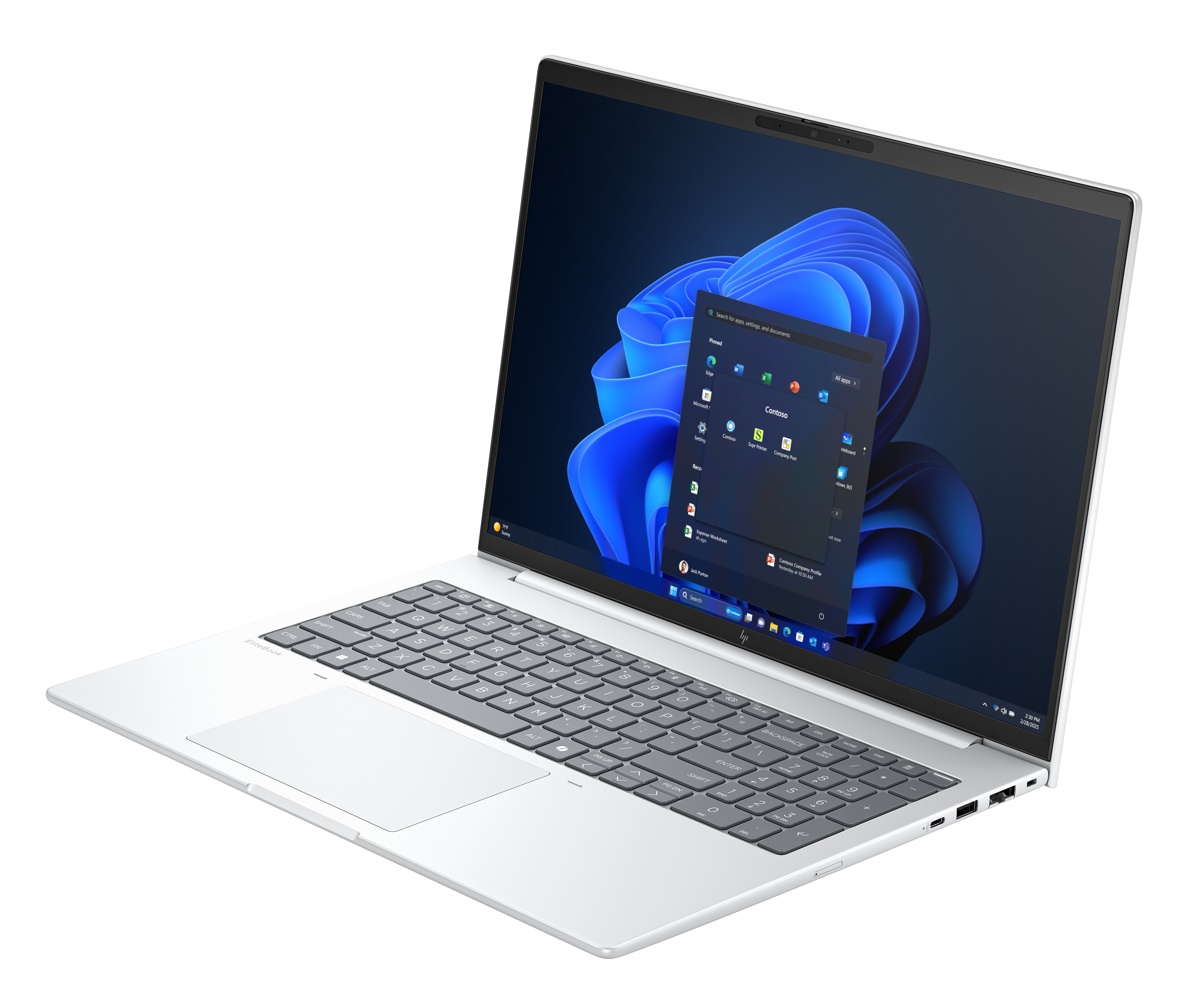 A silver laptop with its screen open, displaying Windows 11.