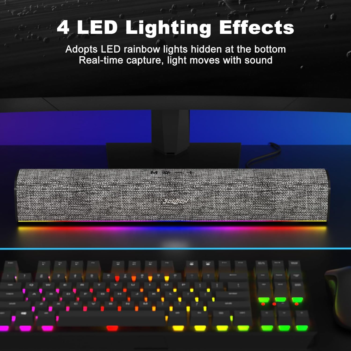 Grauer Lautsprecher mit Regenbogen-LEDs und beleuchteter Tastatur.