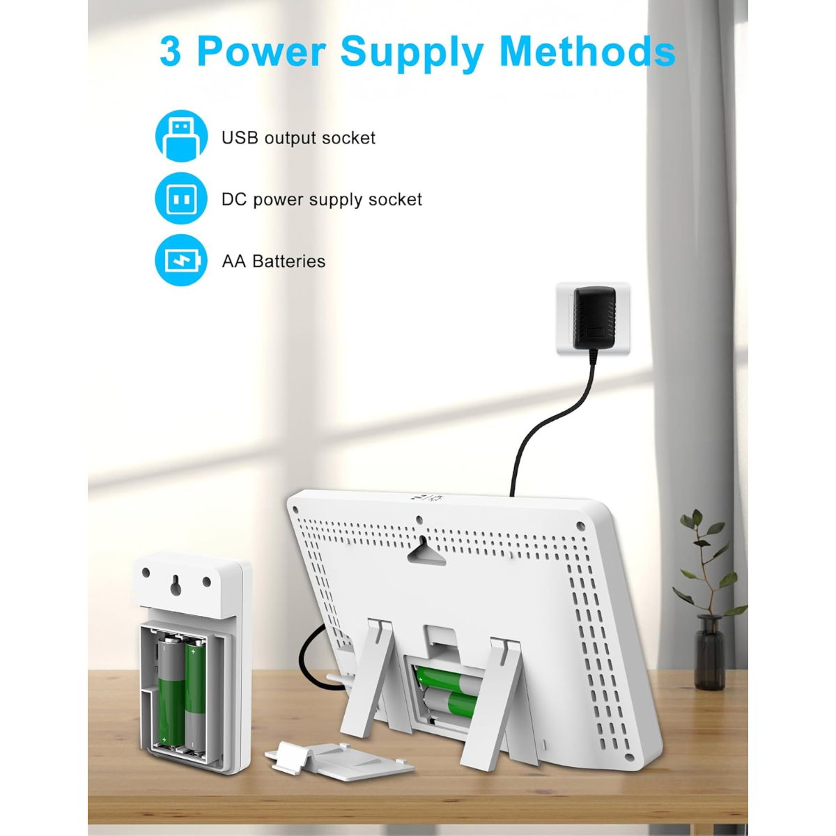 Dispositivo con pilas AA, toma USB y adaptador de corriente.