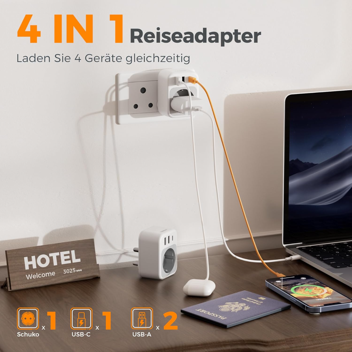 Un adaptador de viaje 4 en 1 carga un teléfono, portátil, auriculares y otro dispositivo.