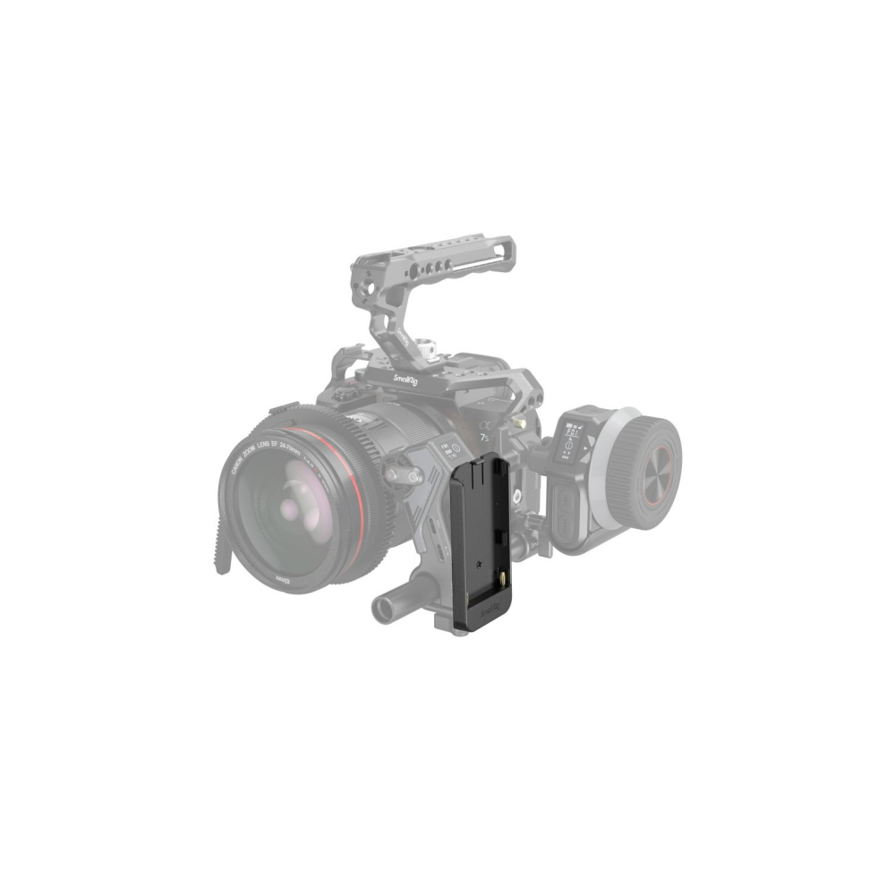 Een zwarte camera kooi met lens en handvat.