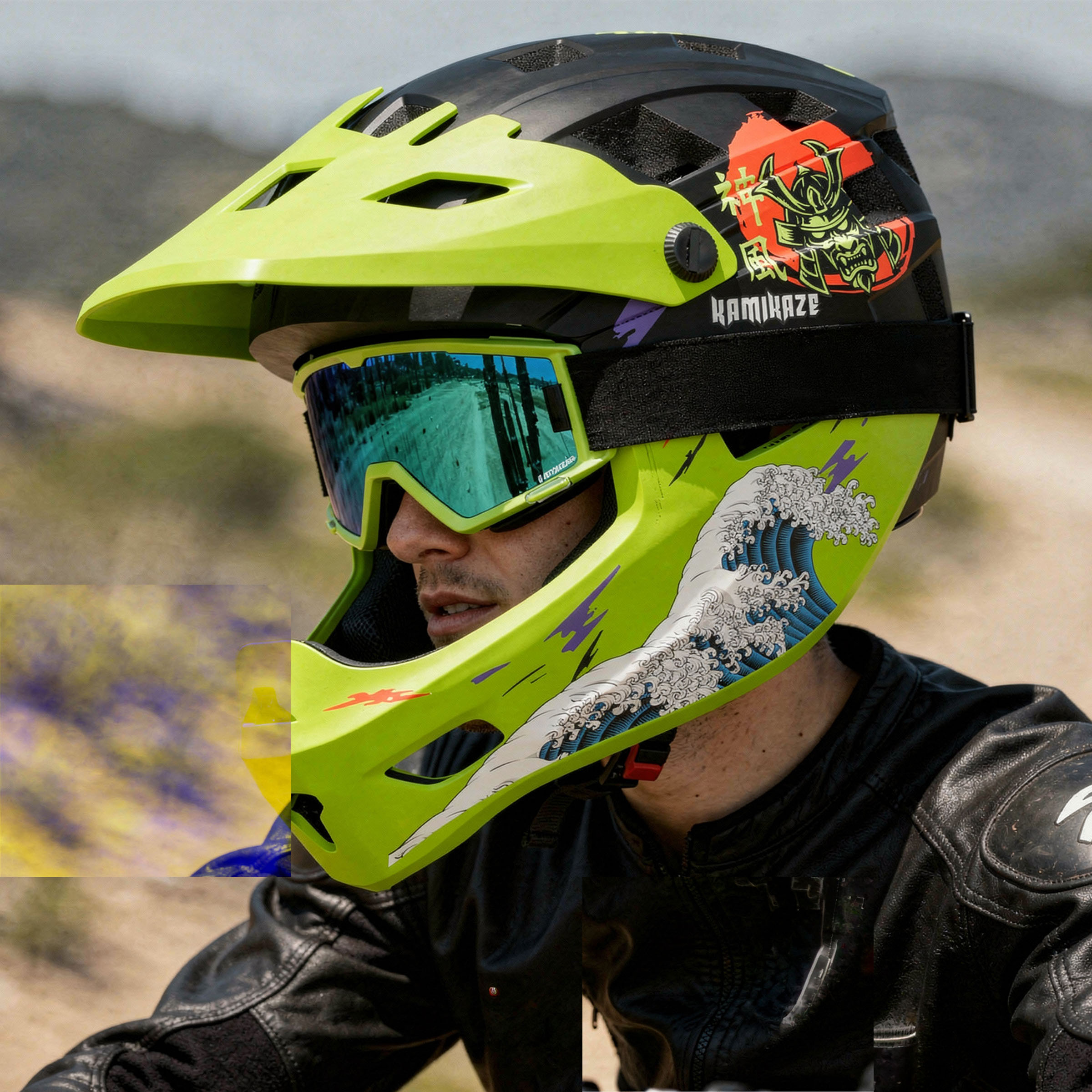 Un uomo indossa un casco verde neon con disegni di samurai e onde e una giacca di pelle nera.