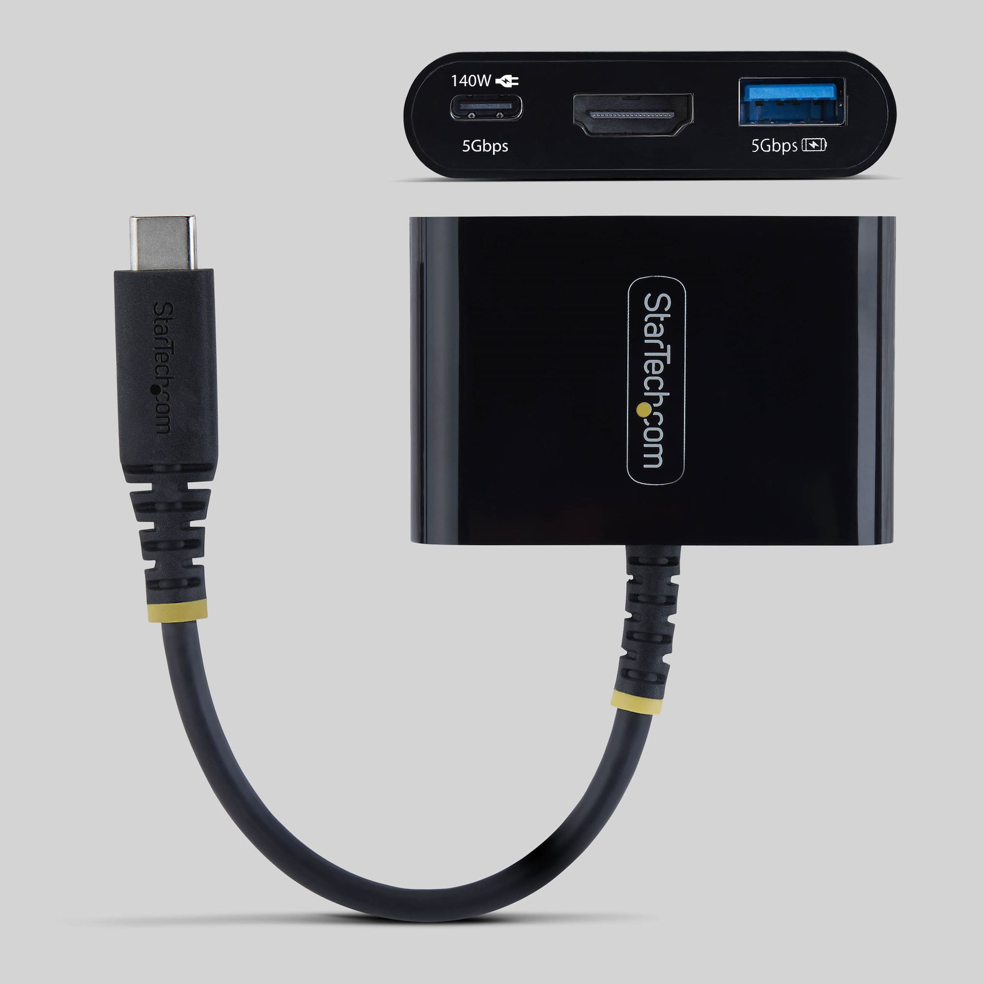Schwarzer StarTech.com Hub mit USB-C-Kabel. Anschlüsse: USB-C, HDMI, USB-A.