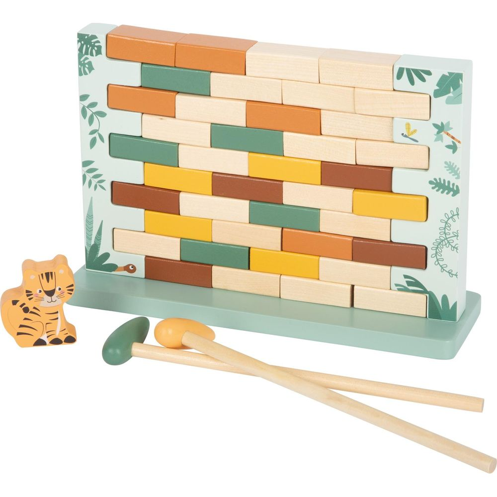 Giocattolo in legno: figura di tigre, muro di blocchi colorati e martelli.