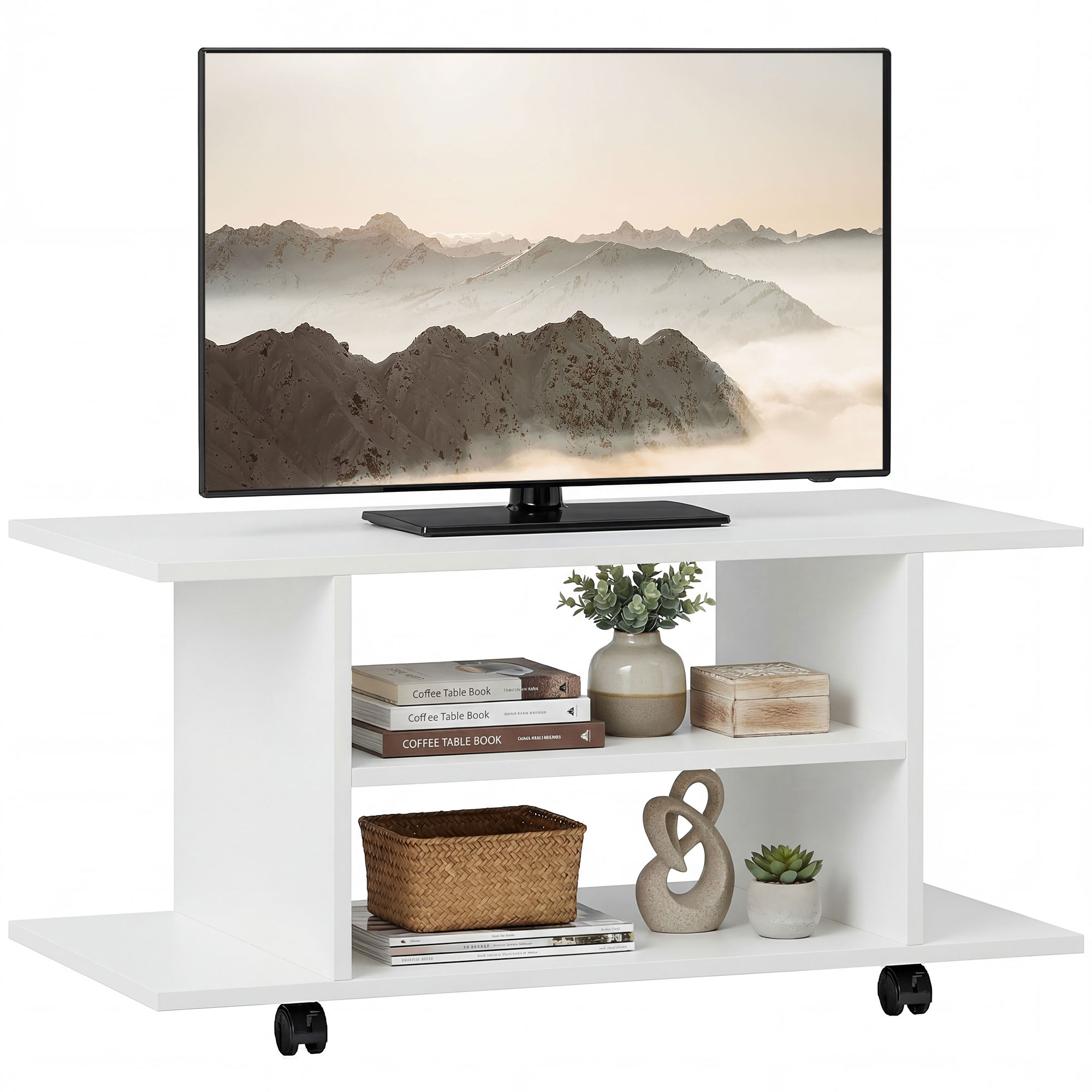 Un tavolino da caffè bianco con TV, libri, vaso e piante.