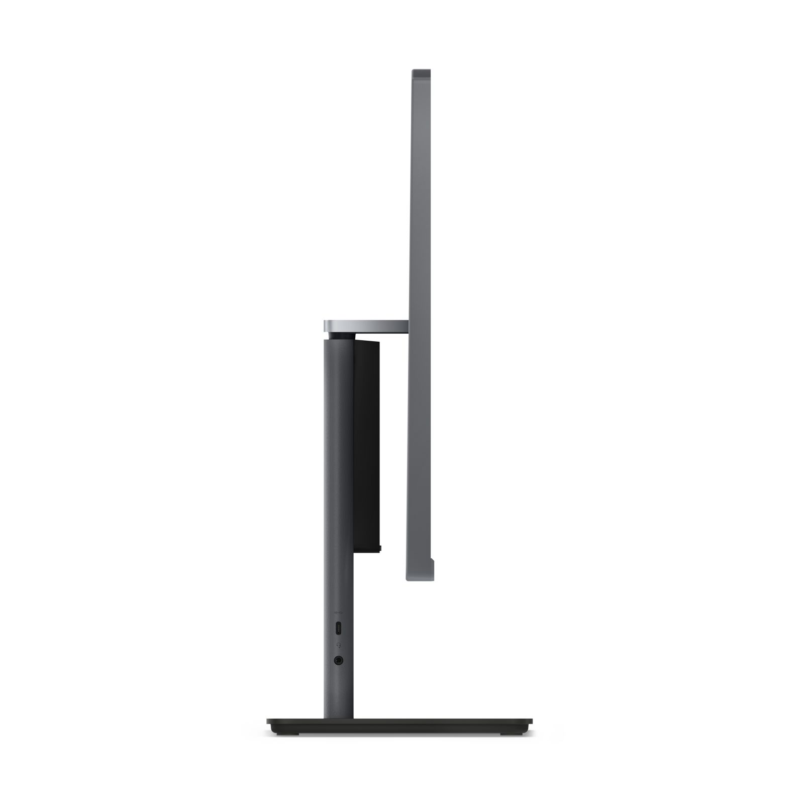 Un monitor grigio con base sottile e supporto integrato, visto di lato.