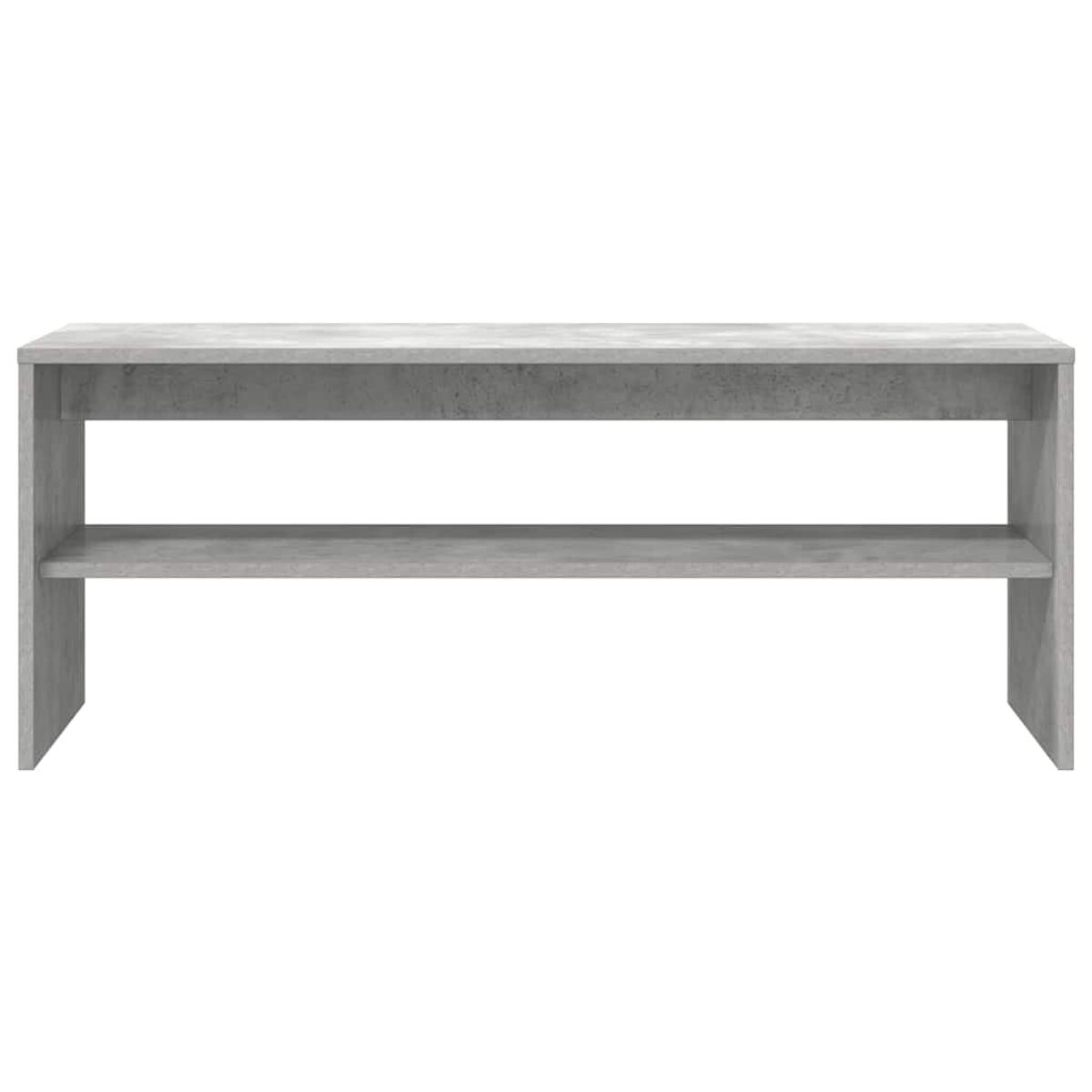 Estantería gris de dos niveles, hecha de material similar al hormigón.