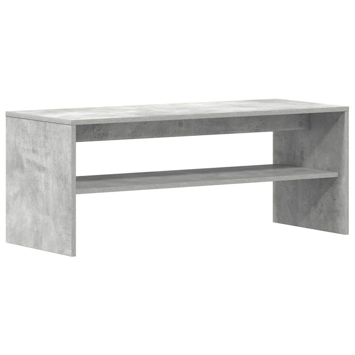 Soporte de TV de hormigón gris con dos estantes abiertos.