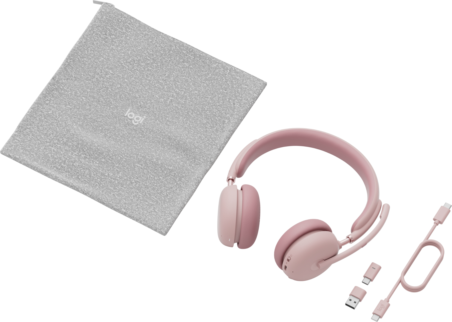Cuffie rosa chiaro con custodia Logitech grigia e cavi USB-C su sfondo bianco.