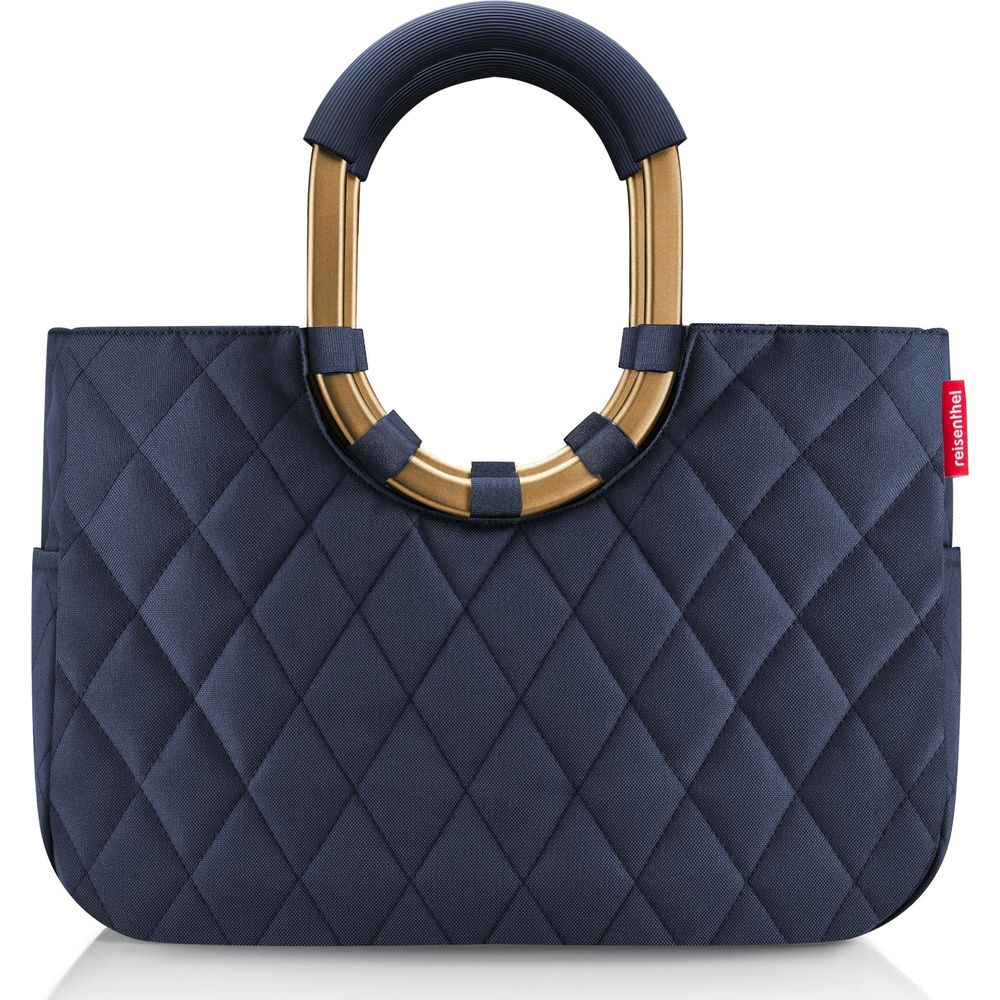 Dunkelblaue gesteppte Tasche mit goldenen Griffen und einem blauen Griff.