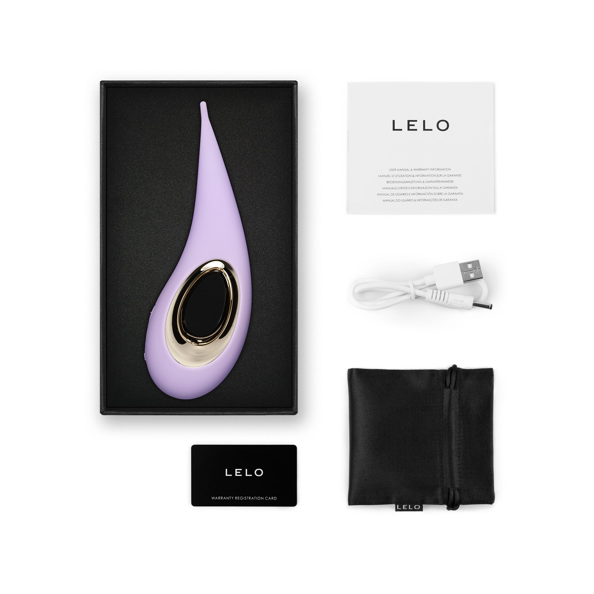 Un vibrador morado con anillo dorado en caja negra, junto a manual, cable y bolsa.