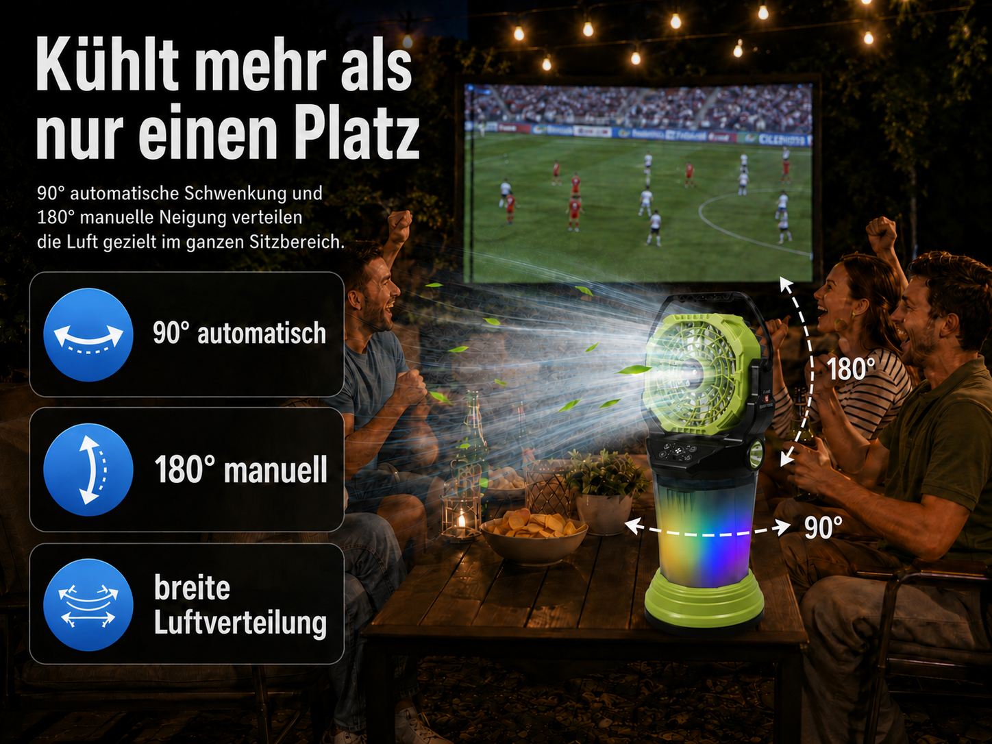 Ein Ventilator mit bunten Lichtern kühlt eine Gruppe von Leuten, die einFußballspiel auf einer Leinwand ansehen.