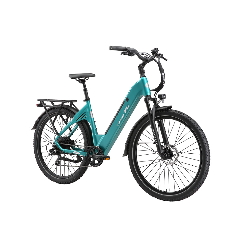 Bicicletta elettrica turchese con portapacchi posteriore e pneumatici larghi.