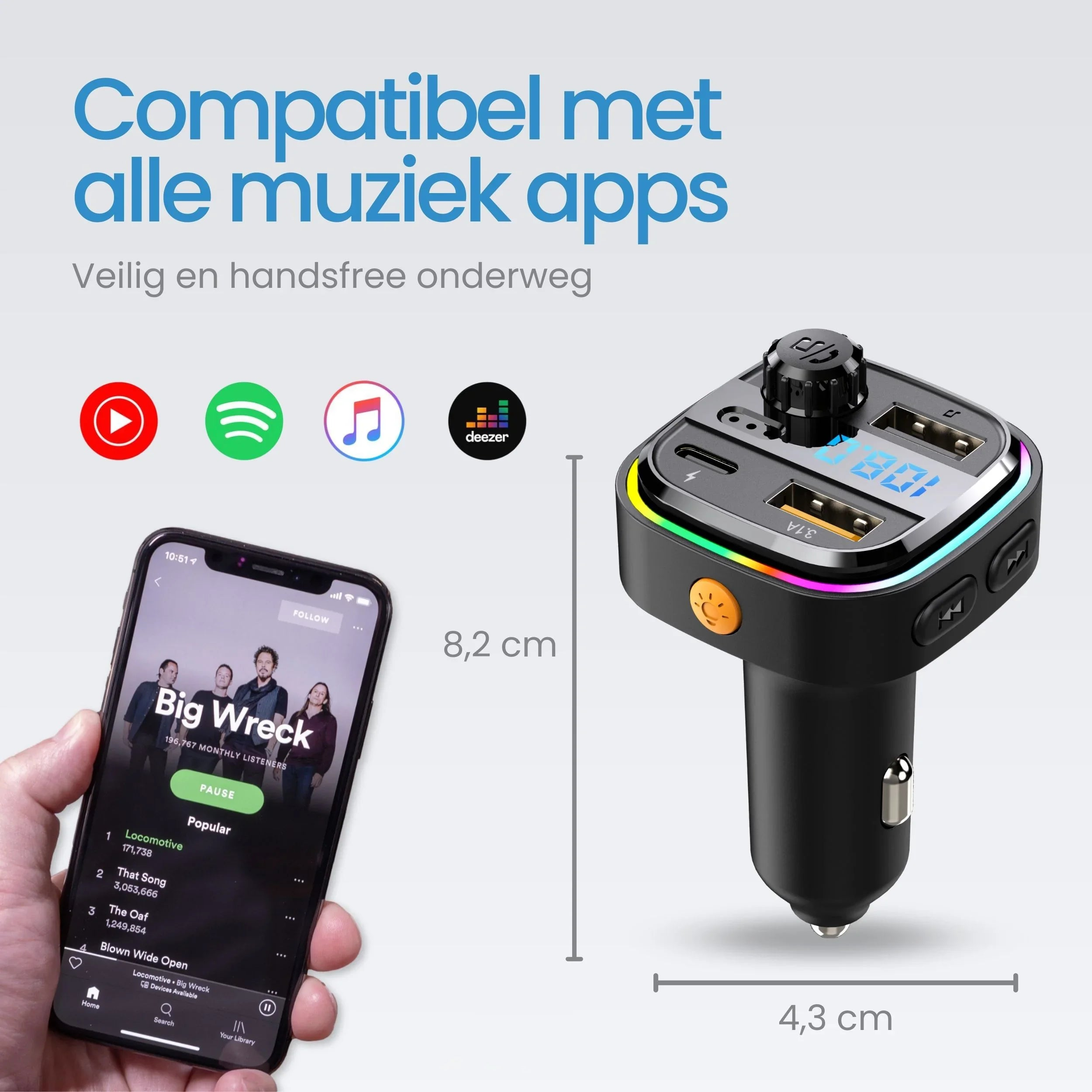 A black car music player with USB ports and a smartphone showing a music app.