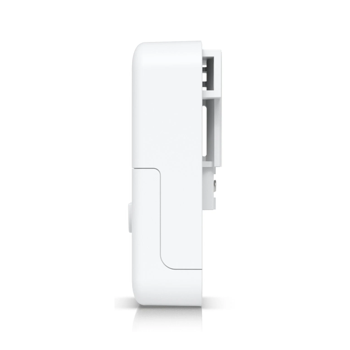 Un dispositivo bianco e rettangolare di profilo con una fessura in alto.