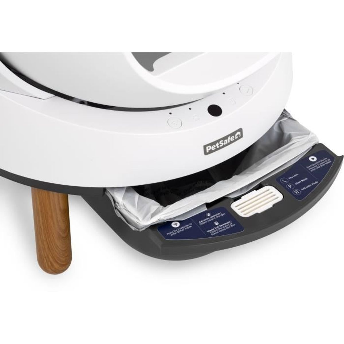 Una lettiera bianca con gamba in legno e cassetto per rifiuti.